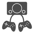 Two gamepads solid icon. Video gaming vector illustration isolated on white. Game controller glyph style design