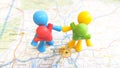 Two gay men holding hands and their babies on a map of Munich Royalty Free Stock Photo