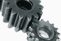 Two gears against white Royalty Free Stock Photo