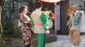 Two geishas posing for photo in Tokyo street