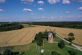 Two generation - Old and New Windmills in farmland, Lithuania, aerial Royalty Free Stock Photo