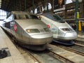 Two genrations of TGV HST trains: Reseau and TMST at Gare du Nord in Paris in France. Royalty Free Stock Photo