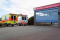 Two german ambulance vehicles stands on hospital