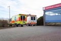 Two german ambulance vehicles stands on hospital