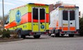 Two german ambulance vehicles stands on hospital