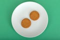 Two Ginger Nut Biscuits on a Plate Royalty Free Stock Photo