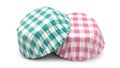 Two gingham-patterned cupcake liners. Royalty Free Stock Photo