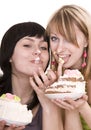 Two girl eating chocolate cake. Royalty Free Stock Photo