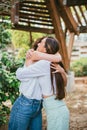 Two girl friends hugging each other Royalty Free Stock Photo