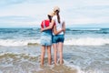 Two girl friends on the sea shore hugging each other Royalty Free Stock Photo