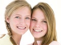 Two girl friends together smiling Royalty Free Stock Photo