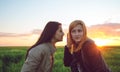 Two girl friends whispering secrets Royalty Free Stock Photo