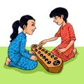 Two girl playing Congkak Royalty Free Stock Photo