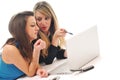 Two girl work on laptop