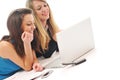 Two girl work on laptop