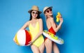 Two girlfriends enjoying summer vacation with toys Royalty Free Stock Photo