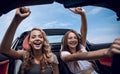 Two girlfriends enjoying a trip in the car Royalty Free Stock Photo