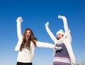 Two girlfriends have fun at winter day