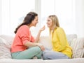 Two girlfriends having a talk at home Royalty Free Stock Photo