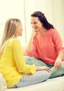 Two girlfriends having a talk at home Royalty Free Stock Photo