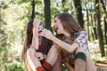 Two girlfriends outdoor laughing Royalty Free Stock Photo