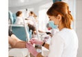 Two girlfriends, pedicure process in beauty salon Royalty Free Stock Photo