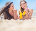 Two girlfriends resting on the beach Royalty Free Stock Photo