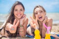 Two girlfriends resting on the beach Royalty Free Stock Photo