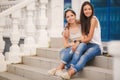 Two girlfriends spend time together in the city Royalty Free Stock Photo