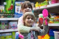 Two girlfriends in toy store Royalty Free Stock Photo