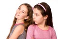 Two girls in the age of ten and eleven dreaming Royalty Free Stock Photo