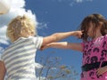 Two girls arguing and pointing