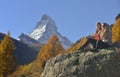 Two girls and autumn scene in Zermatt with Matterhorn mountain Royalty Free Stock Photo