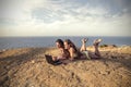 Two girls at the beach chatting Royalty Free Stock Photo