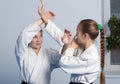 Two girls in black hakama practice Aikido Royalty Free Stock Photo