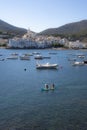 Two girls canoeing at Cadaques, Catalonia, Spain