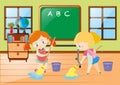 Two girls cleaning classroom together Royalty Free Stock Photo