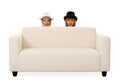 Two girls on the couch Royalty Free Stock Photo