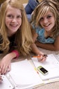 Two girls doing homework Royalty Free Stock Photo