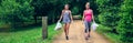 Two girls doing plogging Royalty Free Stock Photo