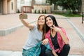 Two girls doing selfie Royalty Free Stock Photo