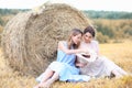 Two girls in dresses in autumn field Royalty Free Stock Photo