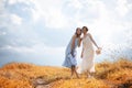 Two girls in dresses in autumn field Royalty Free Stock Photo