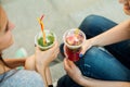 Girls drink cold lemonade Royalty Free Stock Photo