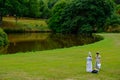 Two girls in Edwardian costumes at Lyme Hall, a historic English