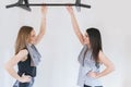 two girls at the gym satisfied after training Royalty Free Stock Photo