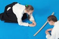 Two girls in hakama bow on Aikido training Royalty Free Stock Photo