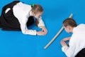 Two girls in hakama bow on Aikido training Royalty Free Stock Photo