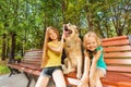 Two girls with happy dog Royalty Free Stock Photo