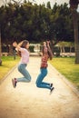 Two girls have fun in park